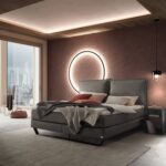 Boxspringbett Celina von Hasena im Schlafzimmer mit Nachttisch
