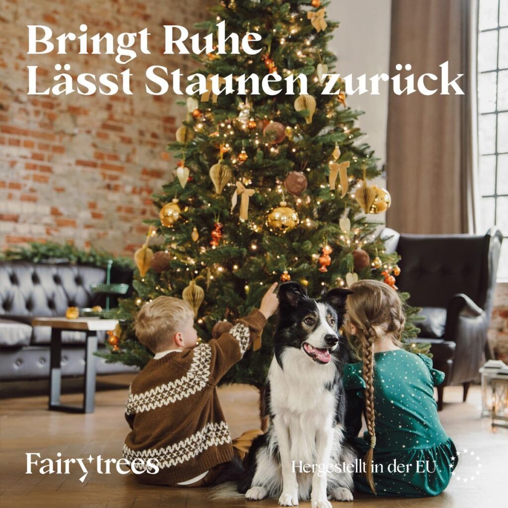 Matratzen kaufen Schweiz, Bettdecken kaufen Schweiz, Kopfkissen kaufen Schweiz Kinder und Hund vor der beleuchteten FairyTrees Nordmanntanne FT29